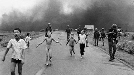 2nd Photo, Vietnam, boy and girl running from napalm attack.